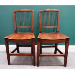 A set of six George III ash and elm stick back dining chairs,