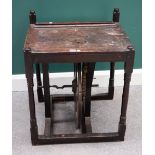 An 18th century oak framed treadle table, possible for wool winding, 60cm wide x 50cm deep.