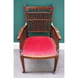 An Edwardian mahogany and bone strung small armchair,