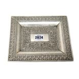 A Middle Eastern rectangular white metal dish,