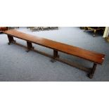 A pair of late Victorian oak long benches,