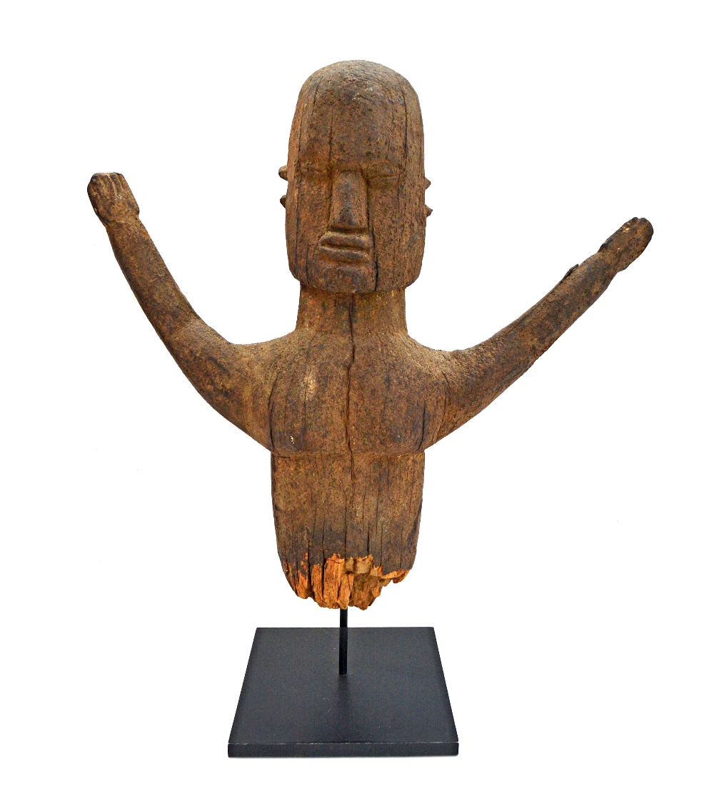 A Lobi Bateba torso, Burkina Faso, with outstretched arms, wood, 46m high.