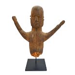 A Lobi Bateba torso, Burkina Faso, with outstretched arms, wood, 46m high.