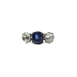 A gold, sapphire and diamond set three stone ring,