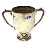 A silver twin handled trophy cup, presentation inscribed, London 1905, weight 444 gms, height 15cm.