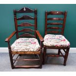 A matched set of six George III Lancashire ladder back rush seated dining chairs,