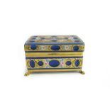 A blue glass casket, 20th century, of rectangular form, gilt decorated and painted with flowers,