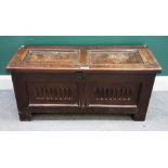 A small 17th century oak coffer, with double panel lid and front, on stile feet,