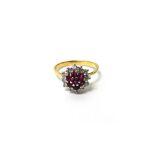 A gold, ruby and diamond set nineteen stone cluster ring,