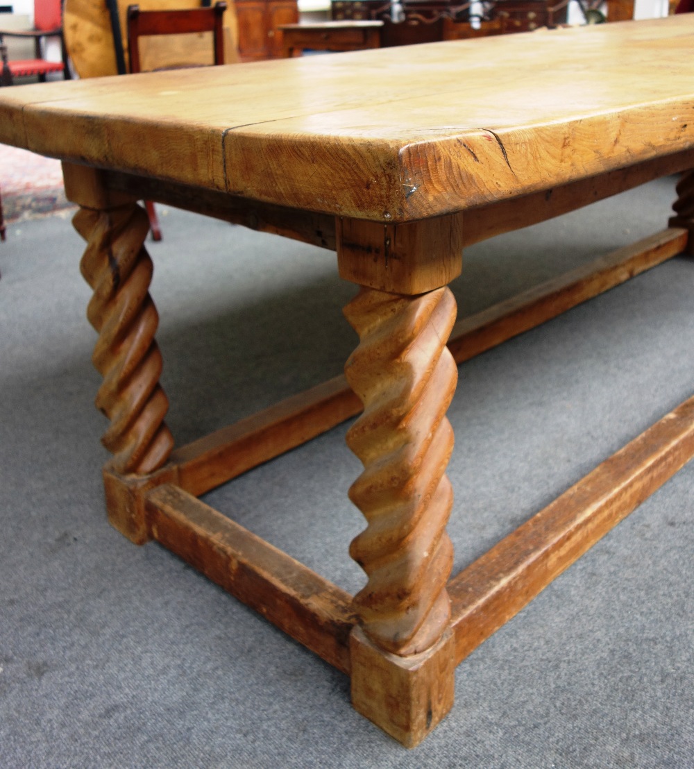 A thick oak four plank kitchen table, on a pitch pine base with barleytwist supports, - Image 4 of 4