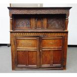 An early 17th century and later oak court cupboard,