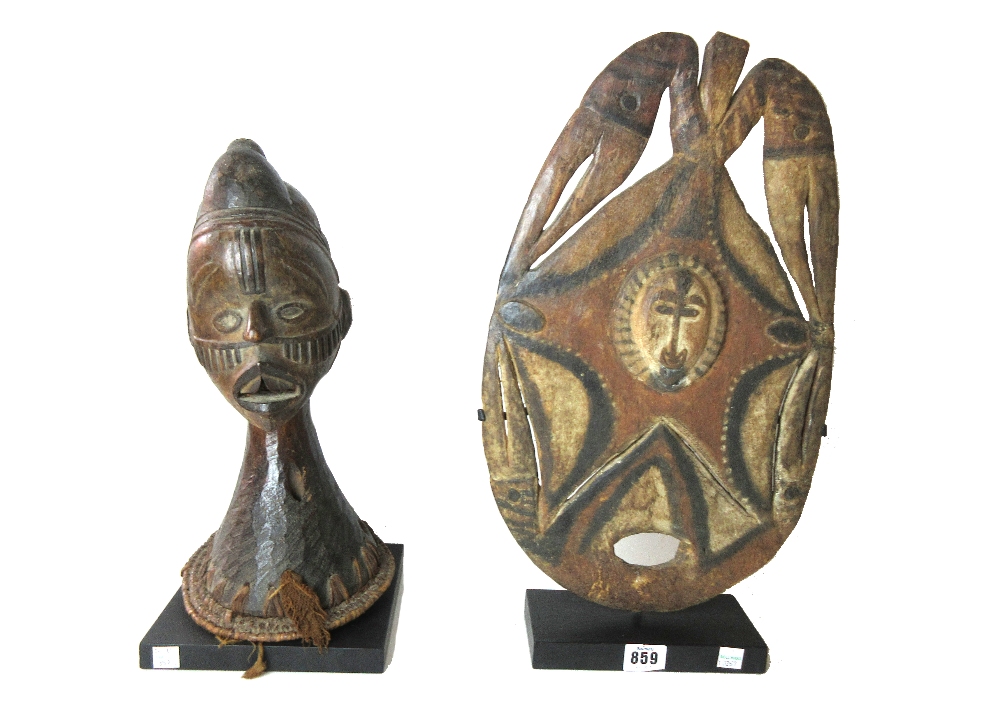 An Abelam Wagnen crest, New Guinea, wood and pigment, 47cm x 27cm,