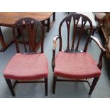 A set of ten 19th century mahogany dining chairs, with carved hoop back on tapering square supports,