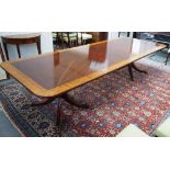 A George III style satinwood banded mahogany 'D' end extending dining table,