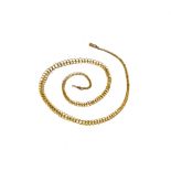 A gold neckchain, in a graduated multiple link design, on a cylindrical clasp, length 42cm,