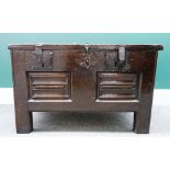 A early 17th century oak coffer/ strong box,