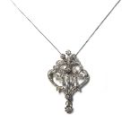 A diamond set pendant necklace, in a pierced openwork stylised floral design,