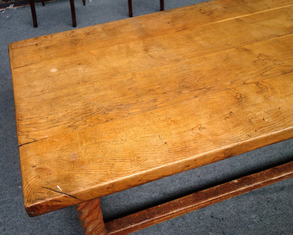 A thick oak four plank kitchen table, on a pitch pine base with barleytwist supports, - Image 3 of 4