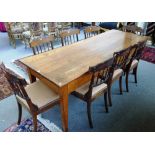 A late 18th century French cherry farm house kitchen table, on tapering square supports,
