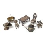 A collection of silver miniatures, comprising; a watering can, a coal scuttle,