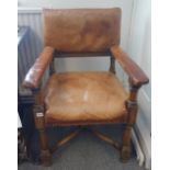 A pair of mid-Victorian oak Gothic revival leather upholstered armchairs,