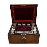 A Victorian figured walnut mother-of-pearl inlaid dome top vanity box, with fitted interior,