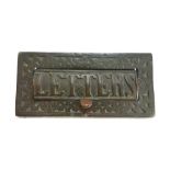 A patinated bronze letter box front, late 19th century,