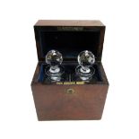 A Victorian figured walnut rectangular twin decanter box, 21cm wide x 25cm high.