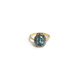 A blue zircon and diamond fifteen stone cluster ring,