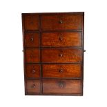 An early 19th century mahogany table top collector's chest, with five short and five long drawers,