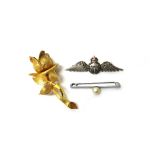 A 9ct gold brooch, designed as a flower spray, weight 7.