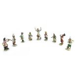 A set of nine Sitzendorf monkey band porcelain figures, 20th century, including The Conductor,