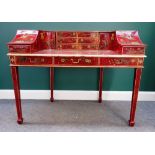 An 18th century style red lacquer Carlton House style desk, on tapering square supports,