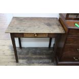 A George III oak side table, the rectangular top above a frieze drawer, on square chamfered legs,