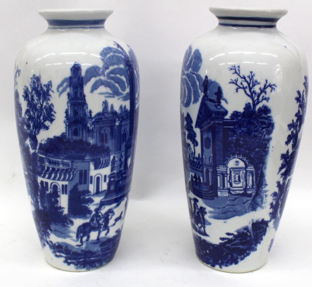 A pair of Asian blue and white porcelain vases, 20th century, tapered cylindrical form,