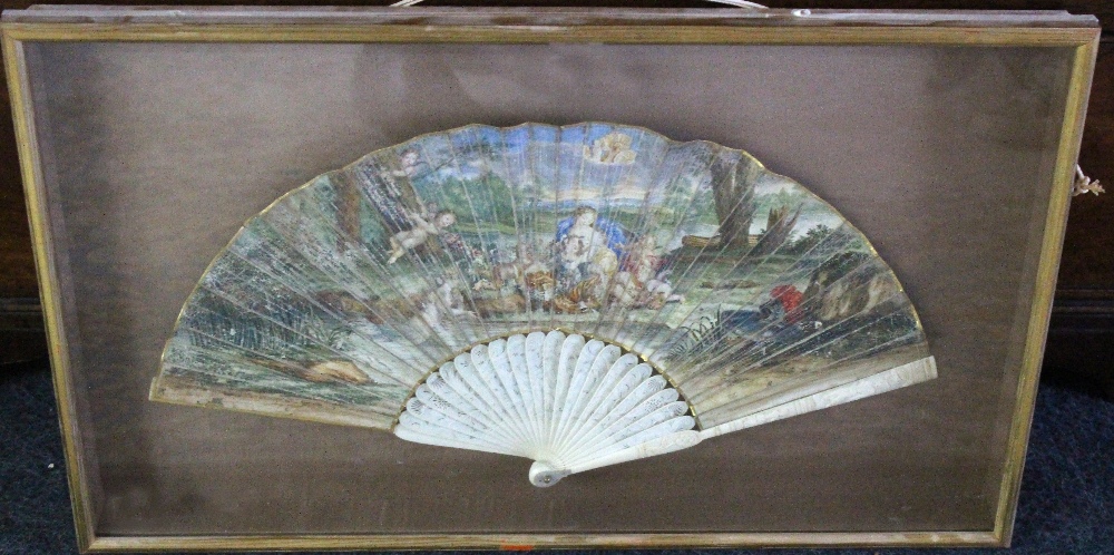 A fan, first half 19th century, the leaf painted with a romantic figual scene, cherubs and nymph,