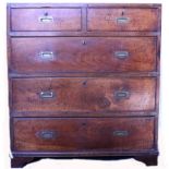 A Victorian teak campaign chest, in two parts, having sunk brass corners and handles,