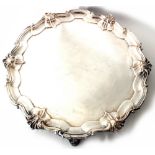 A large late Victorian shaped circular silver salver, Messrs Barnards, London 1898,