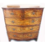 A late George III mahogany bowfront chest, fitted with two short and three long drawers,