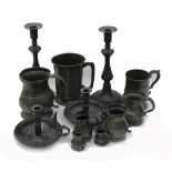 A Victorian pewter Quart mug, with moulded bands and spreading foot,