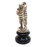 A French 1930's 'Michelin Man Bibendum Boxer car mascot, nickel plated on bronze,