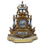 R & Co: A French gilt metal and porcelain mounted mantel clock, circa 1870,