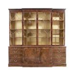 A George III mahogany breakfront library bookcase, in the manner of Thomas Chippendale,