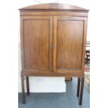 A George III mahogany cabinet,