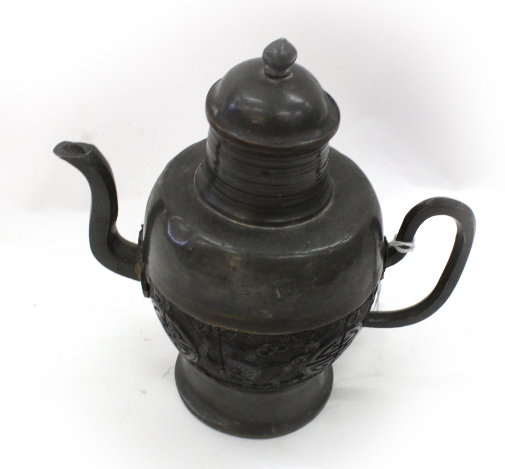 A Chinese coconut and pewter mounted wine pot and cover, late 19th/early 20th century,