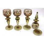 A set of four Venetian amber tinted glass rhoemers, circa 1900,