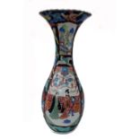 A tall Japanese Imari vase, Meiji, of elongated pear form with frilled rim,
