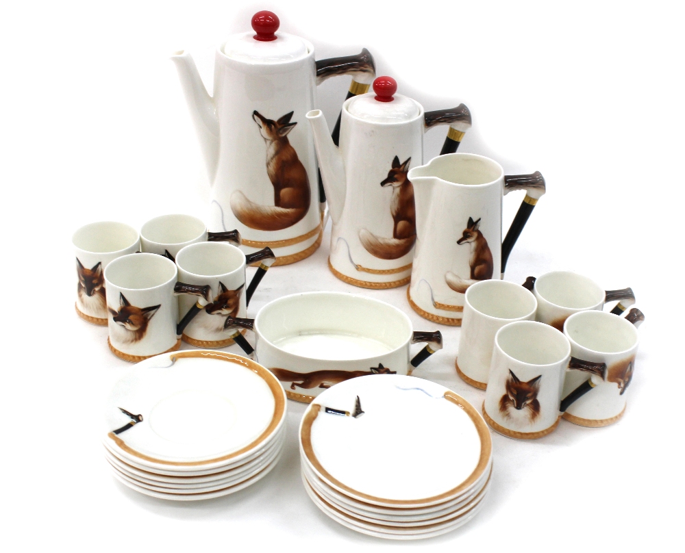 A Royal Doulton bone china coffee service, H 4927, each piece decorated with a fox,