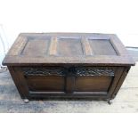 A late 17th century oak coffer, of panelled construction,