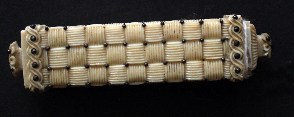 An early 19th century ivory tooth pick b